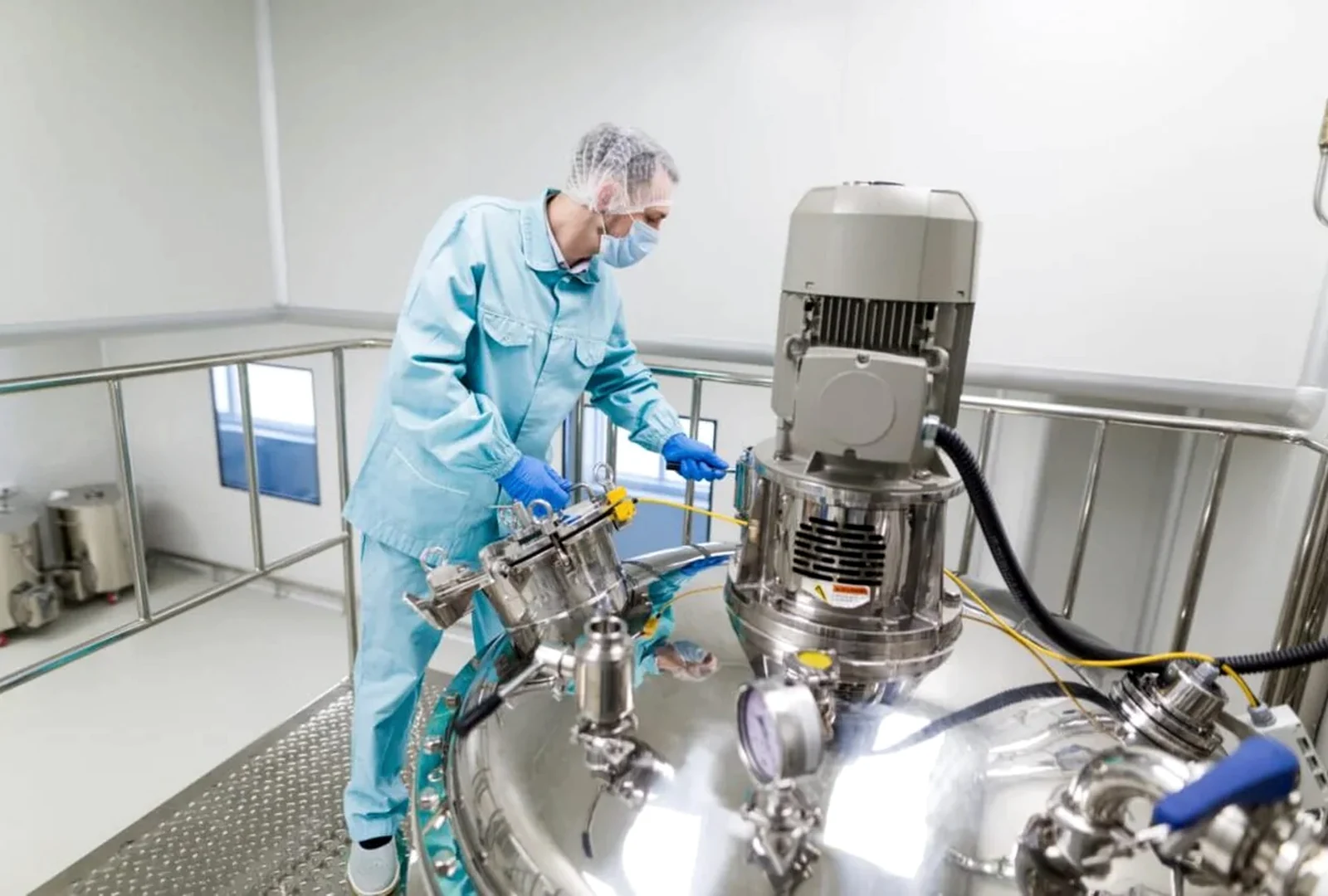 Production operator working with process equipment